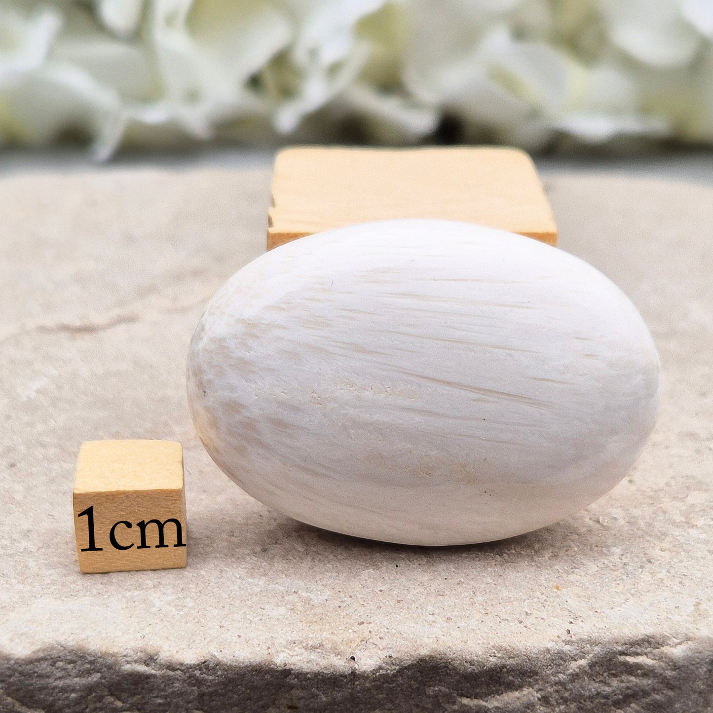 Soothing Scolecite for serenity and balance. Supports meditation, relaxation, and emotional healing with its soft, high-vibrational energy.