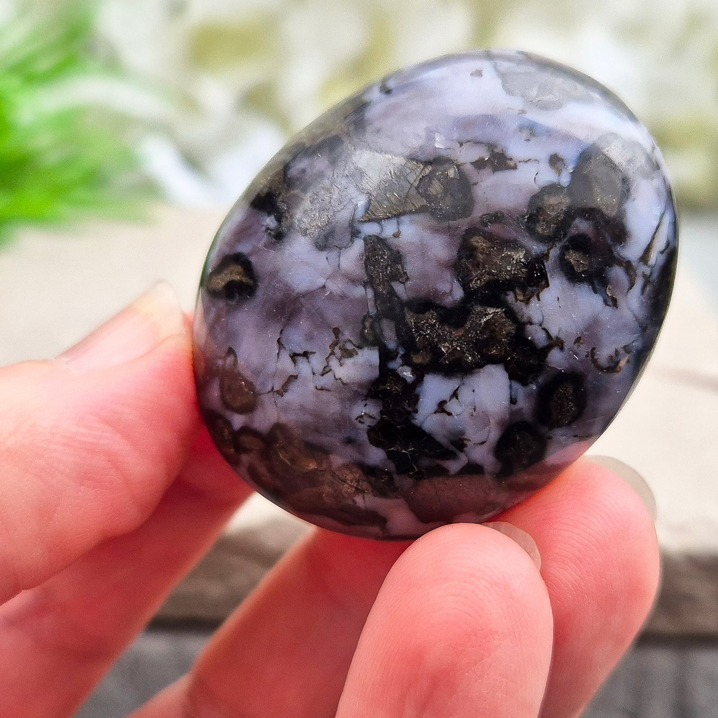 Indigo Gabbro palm stone for grounding, balancing energy, and supporting emotional awareness. Smooth, polished, perfect for meditation or holding.