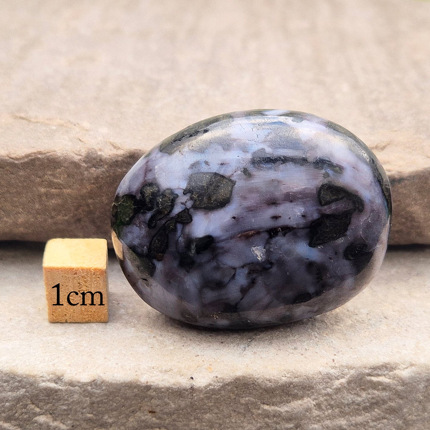 Mystic Merlinite (indigo gabbro) palm stone for energy work, intuition & emotional healing. Ideal for meditation, grounding & spiritual growth.