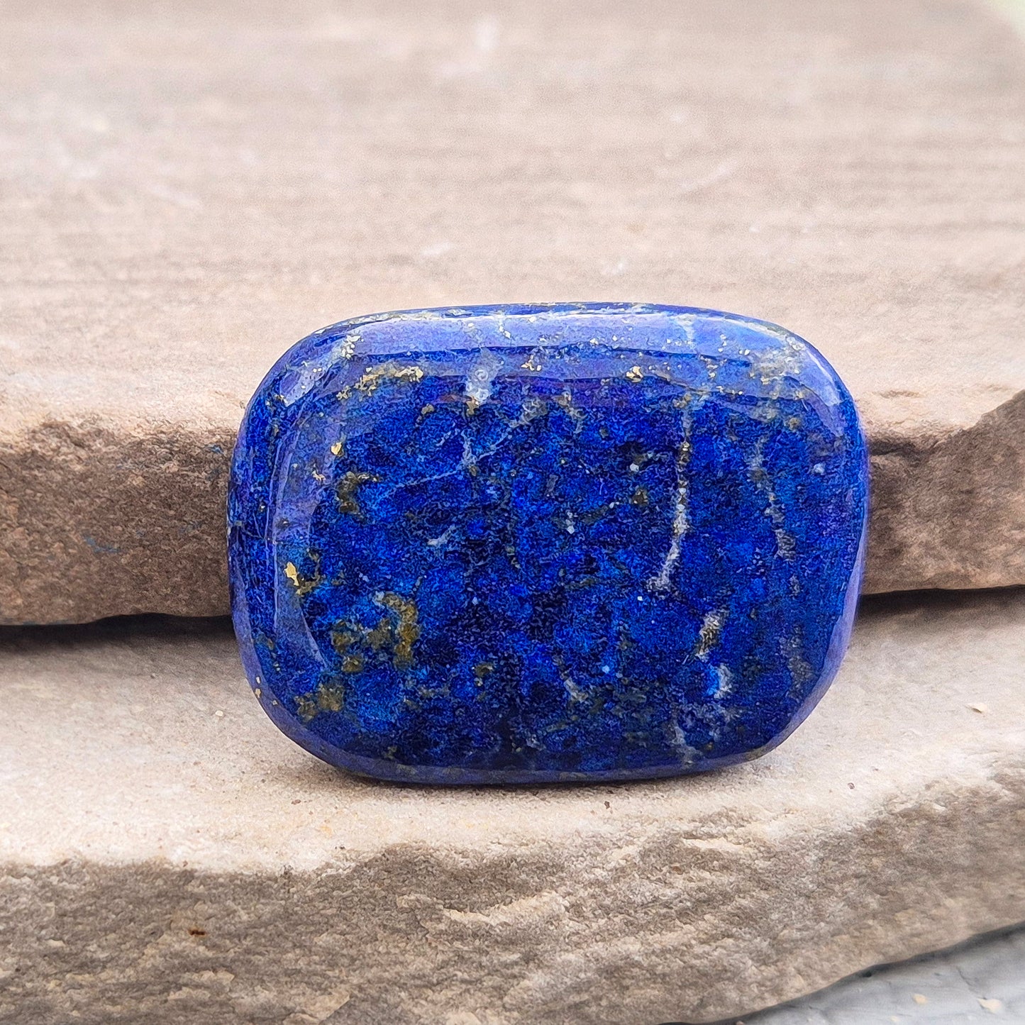 Lapis Lazuli rectangle palm stone for clear communication and confidence. A smooth blue crystal linked to the throat and third eye chakras.