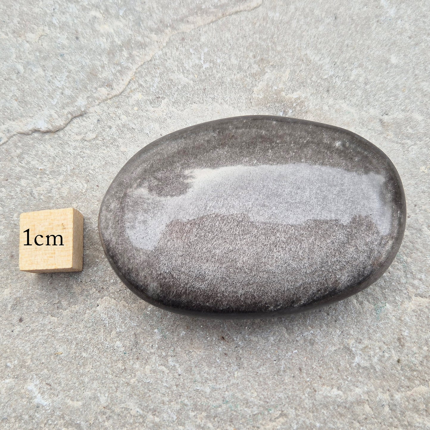 Grounding and protective Silver Sheen Obsidian crystal that enhances self-awareness, inner strength, and emotional balance.