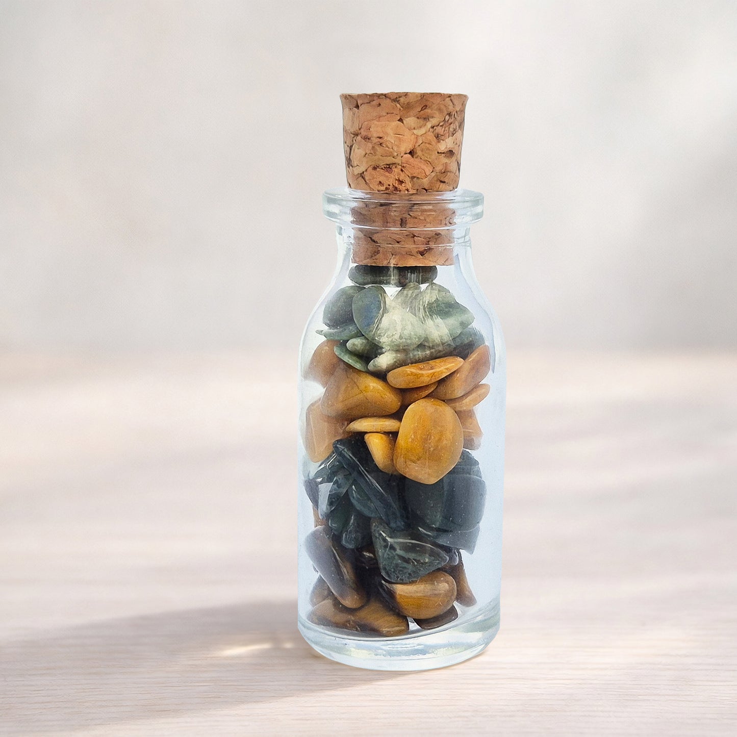 Inner Balance crystal bottle with jade, tiger eye, moss agate and jasper. A grounding decorative blend for calm focus, steady confidence and thoughtful gifting.