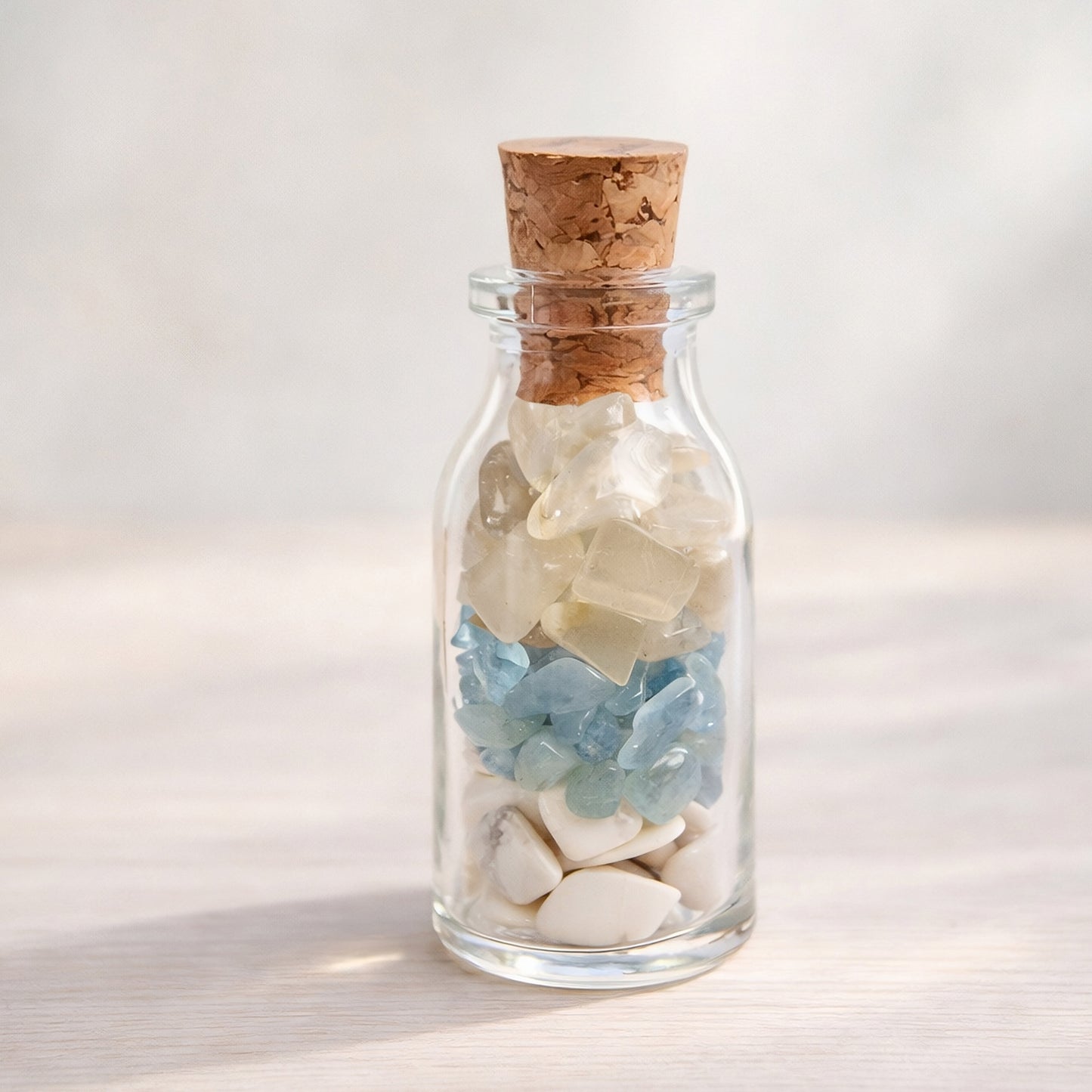 NVM Never Mind crystal blend bottle with howlite, aquamarine and moonstone. A decorative grounding piece for letting go, emotional reset and calm detachment.