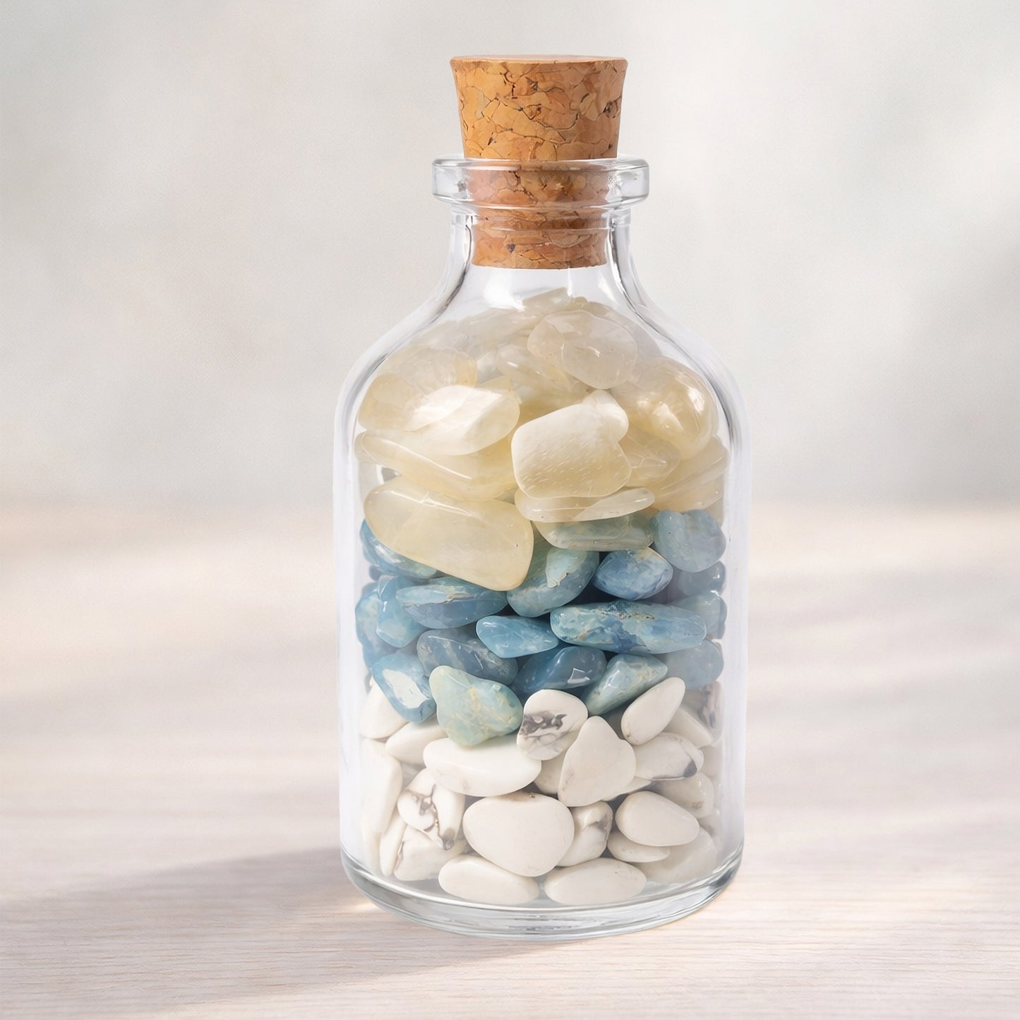 NVM Never Mind crystal blend bottle with howlite, aquamarine and moonstone. A decorative grounding piece for letting go, emotional reset and calm detachment.
