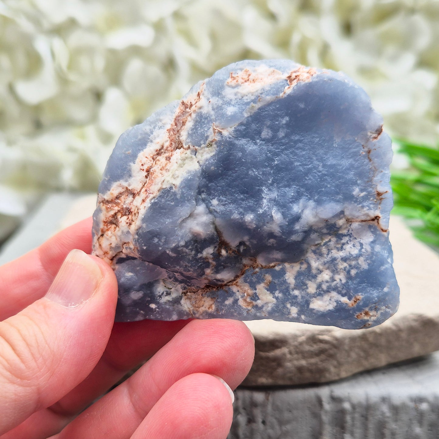 Natural Angelite polished standing freeform from Peru with soft blue tones and raw natural backing. A calming crystal for peaceful spaces.