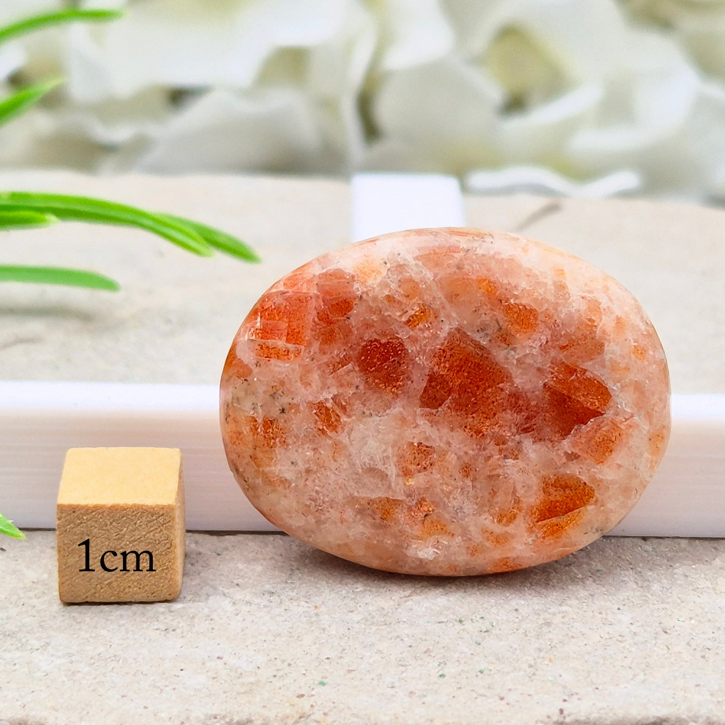 Sunstone Palm Stone – crystal of joy, vitality and confidence. Smooth and polished for meditation, energy work, or carrying uplifting energy with you.