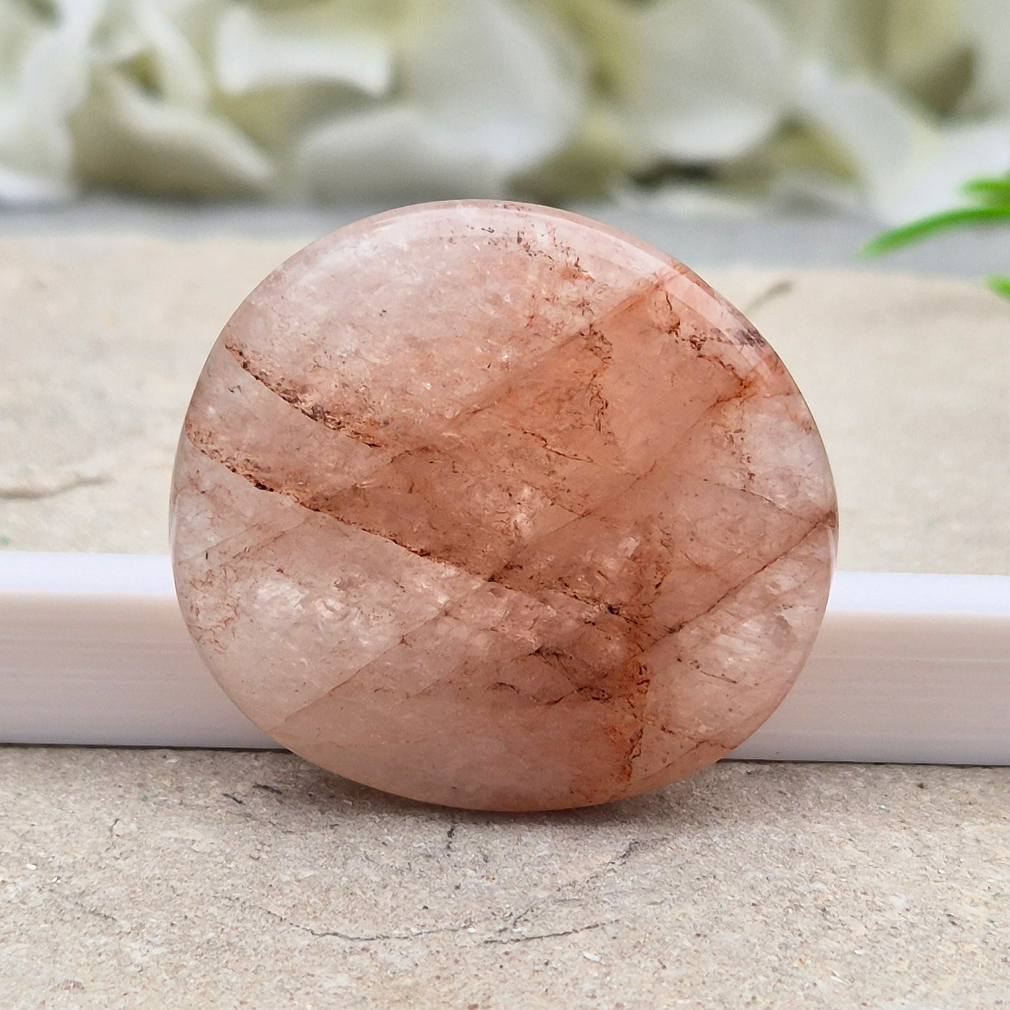 Natural Crimson Healer Palm Stone (Hematoid Quartz). Traditionally used for grounding, focus and self-belief.