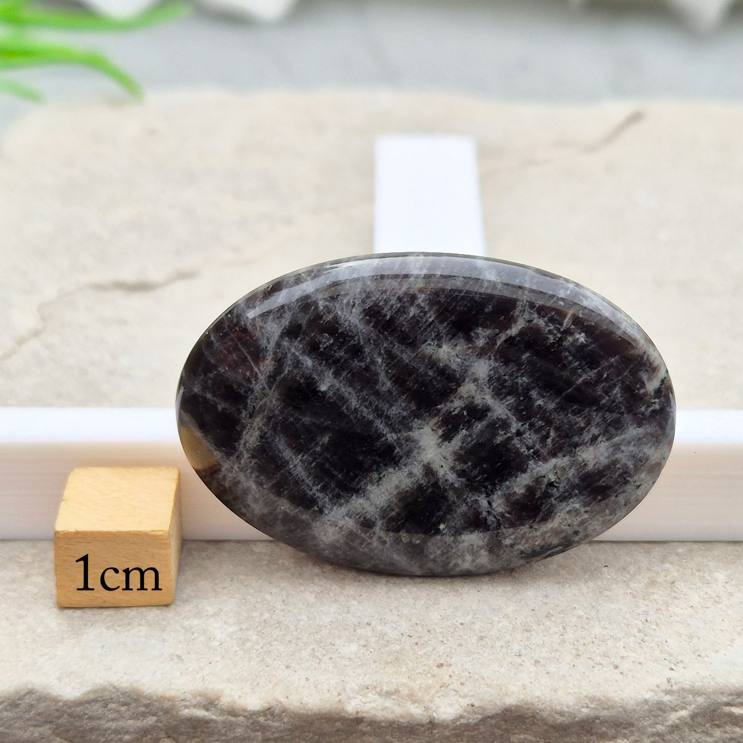 Black Moonstone, valued for its connection to the moon’s energy. Perfect for enhancing intuition, emotional healing, and balancing energy.