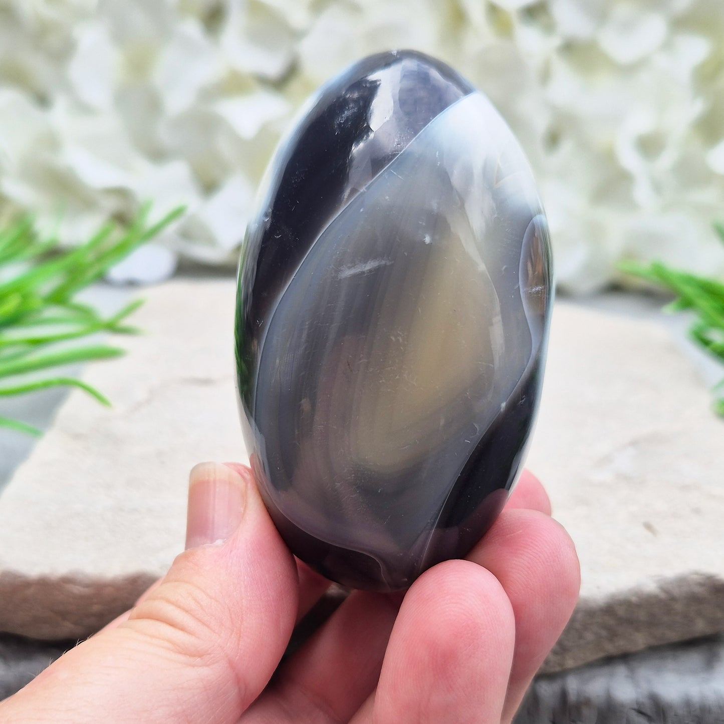 Orca Agate also known as Grey Agate, it has black, dark charcoal grey and white patterning, with soft, out-of-focus white markings as a natural feature of the stone. No two pieces show the same pattern and colouring.