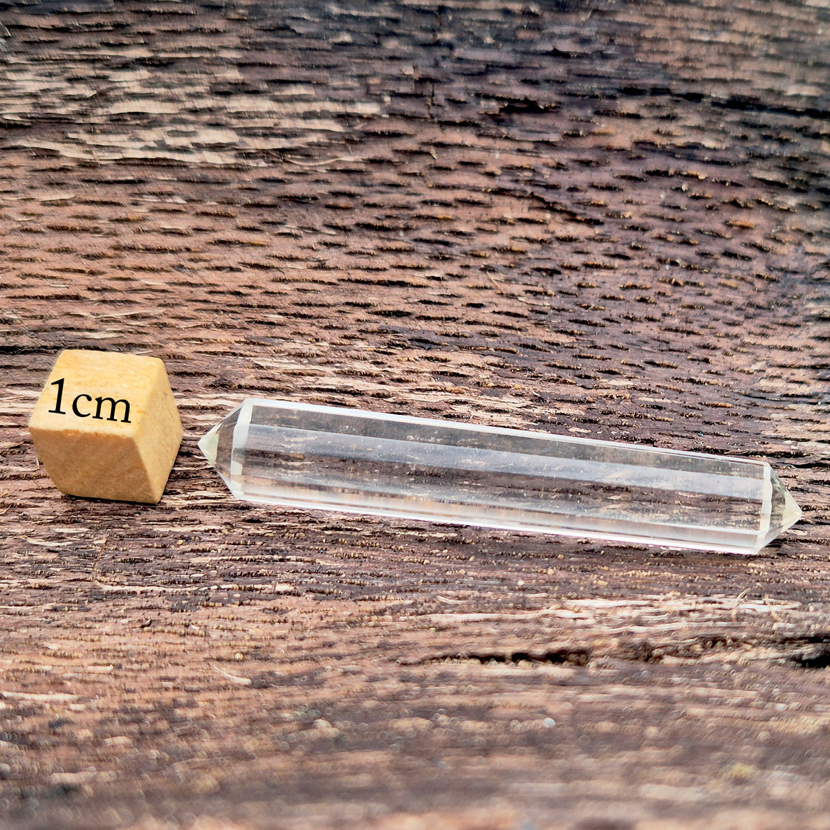 Mini 12-sided quartz wand, Vogel-style double terminated point. Known for focus, clarity and directing energy in meditation or energy work.