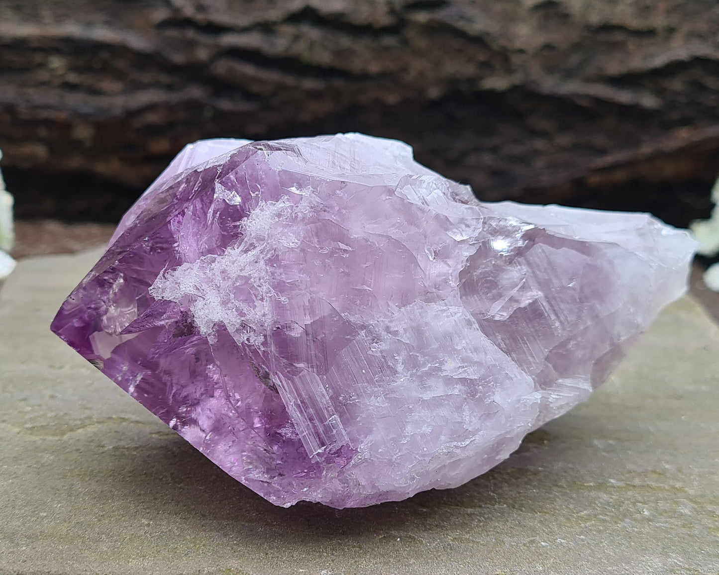 Brazilian Amethyst Crystal Point with dark purple color, polished tip, and natural body, also known as Amethyst Root.