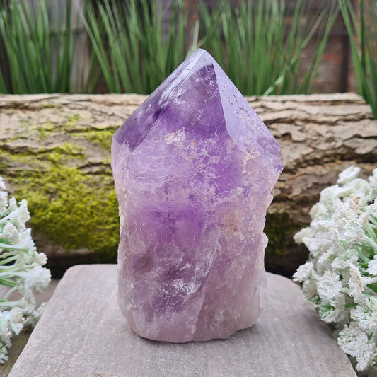 Amethyst Point from Brazil. Fabulous large standing point with 6 polished sides at the tip, the point is polished and the rest is natural. 