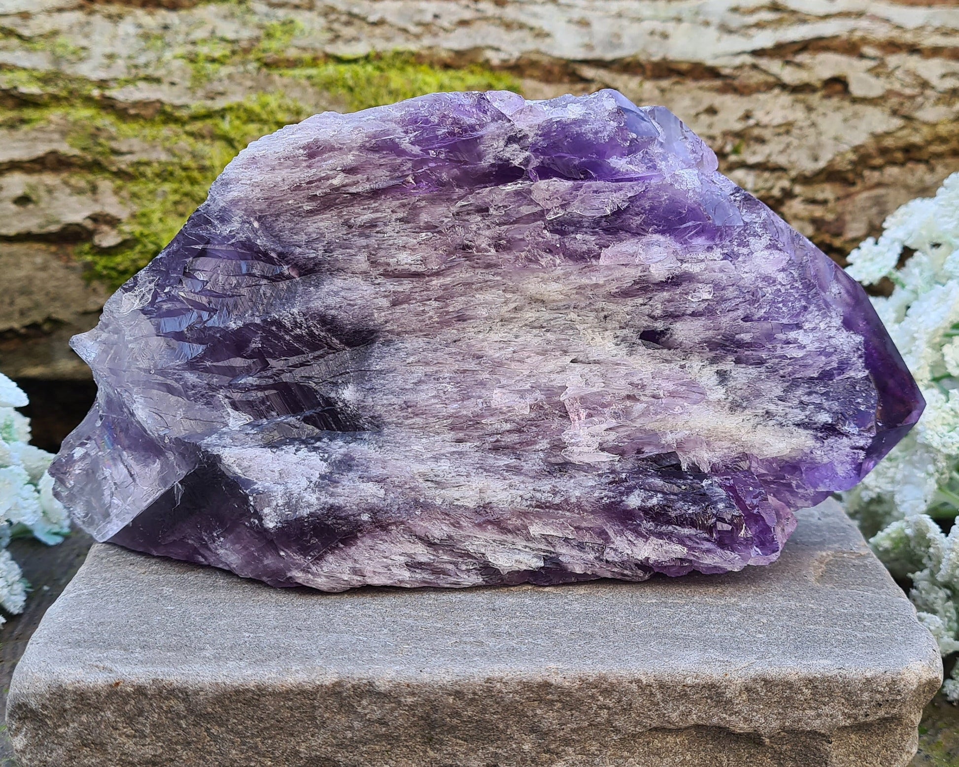 Elestial Amethyst from Brazil with layered formations and a natural point — deep spiritual insight, emotional healing, and peaceful energy.