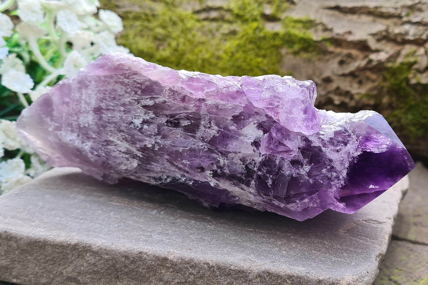 Elestial Amethyst from Brazil with layered formations and a natural point — deep spiritual insight, emotional healing, and peaceful energy.