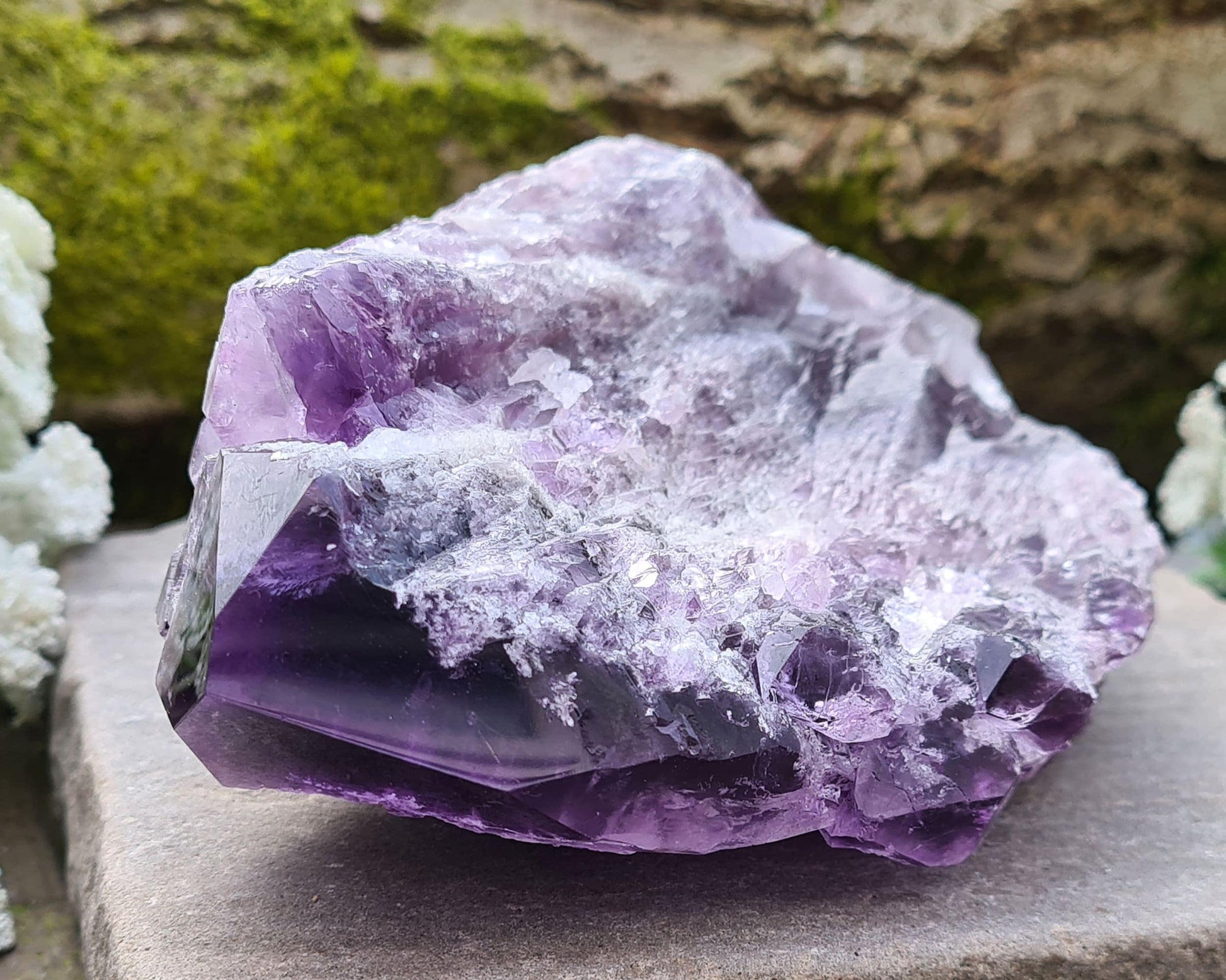 Elestial Amethyst from Brazil with layered formations and a natural point — deep spiritual insight, emotional healing, and peaceful energy.
