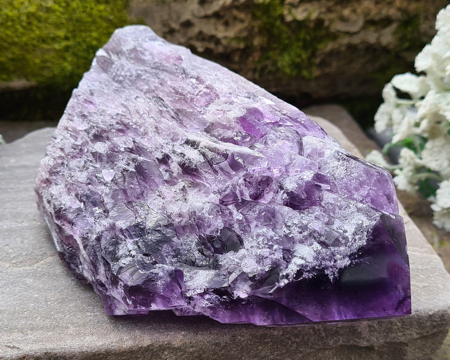 Elestial Amethyst from Brazil with layered formations and a natural point — deep spiritual insight, emotional healing, and peaceful energy.