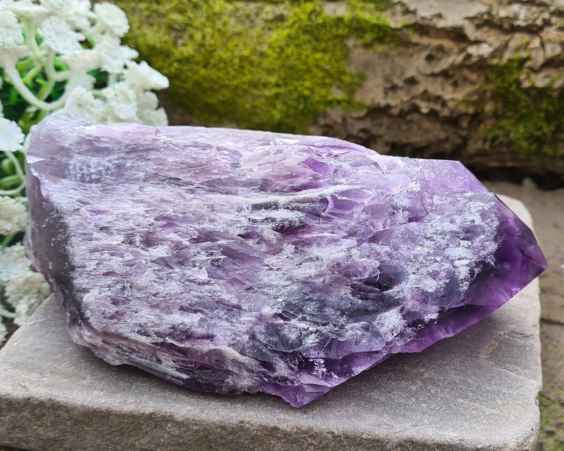 Elestial Amethyst from Brazil with layered formations and a natural point — deep spiritual insight, emotional healing, and peaceful energy.