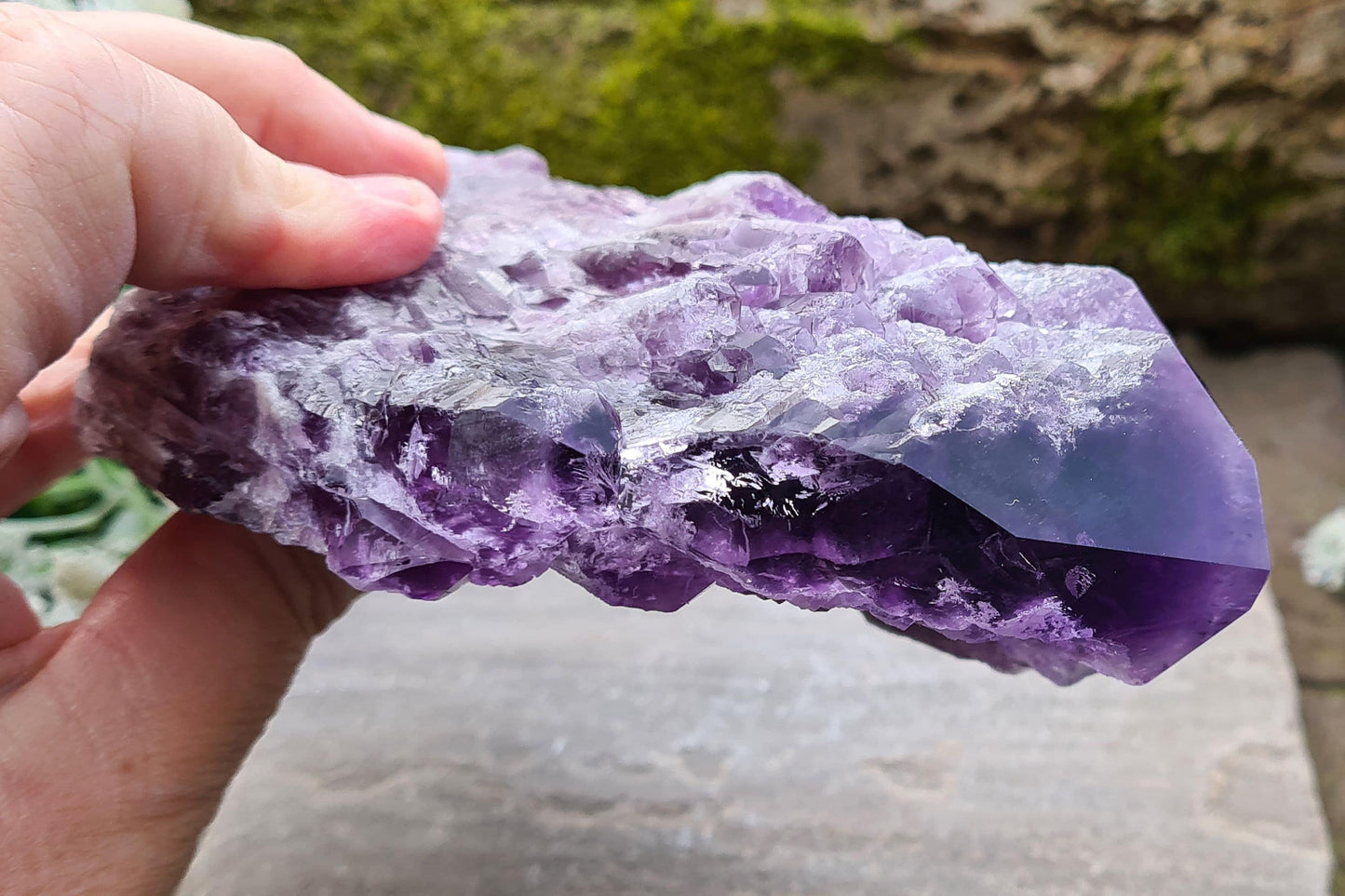 Elestial Amethyst from Brazil with layered formations and a natural point — deep spiritual insight, emotional healing, and peaceful energy.
