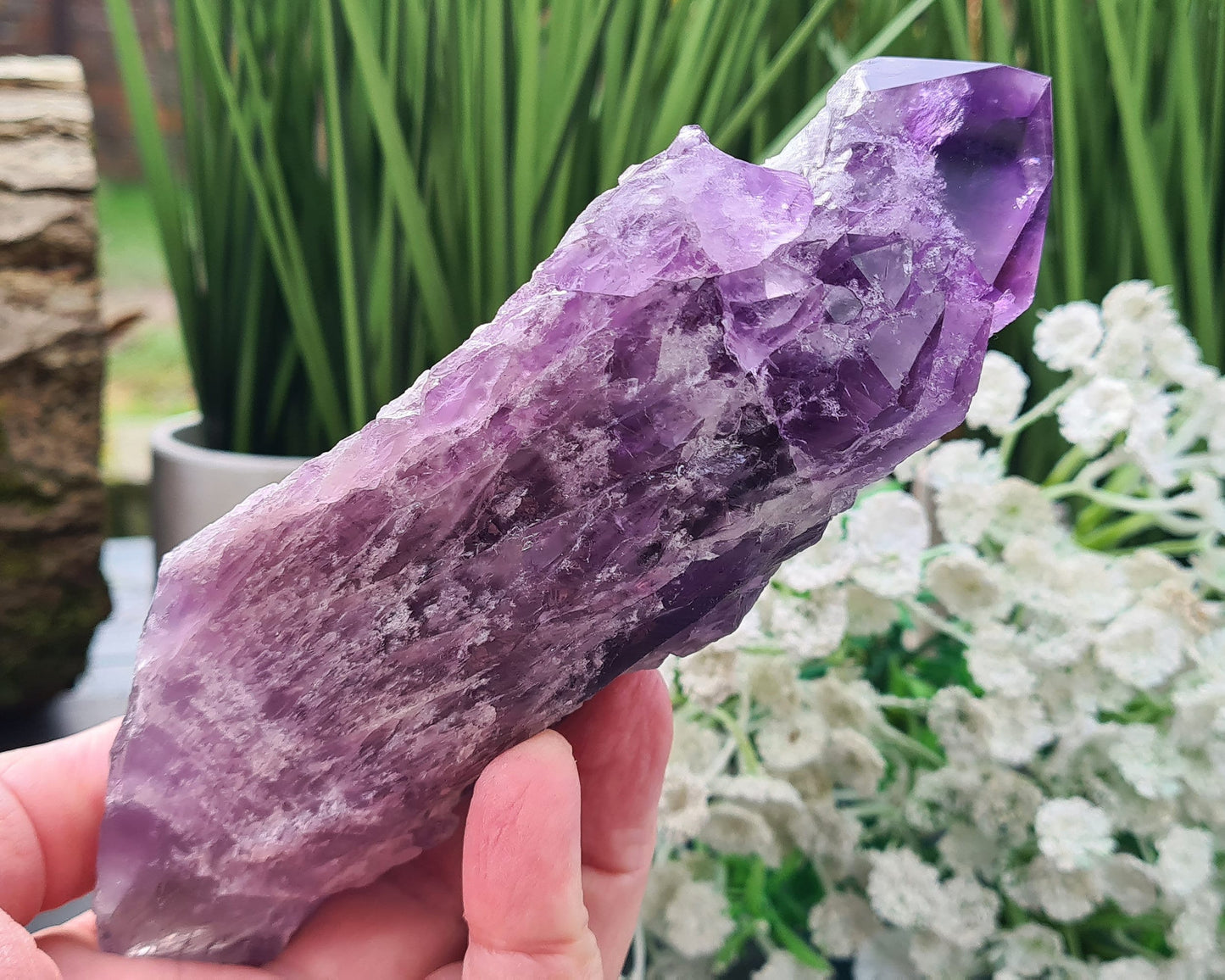 Elestial Amethyst from Brazil with layered formations and a natural point — deep spiritual insight, emotional healing, and peaceful energy.