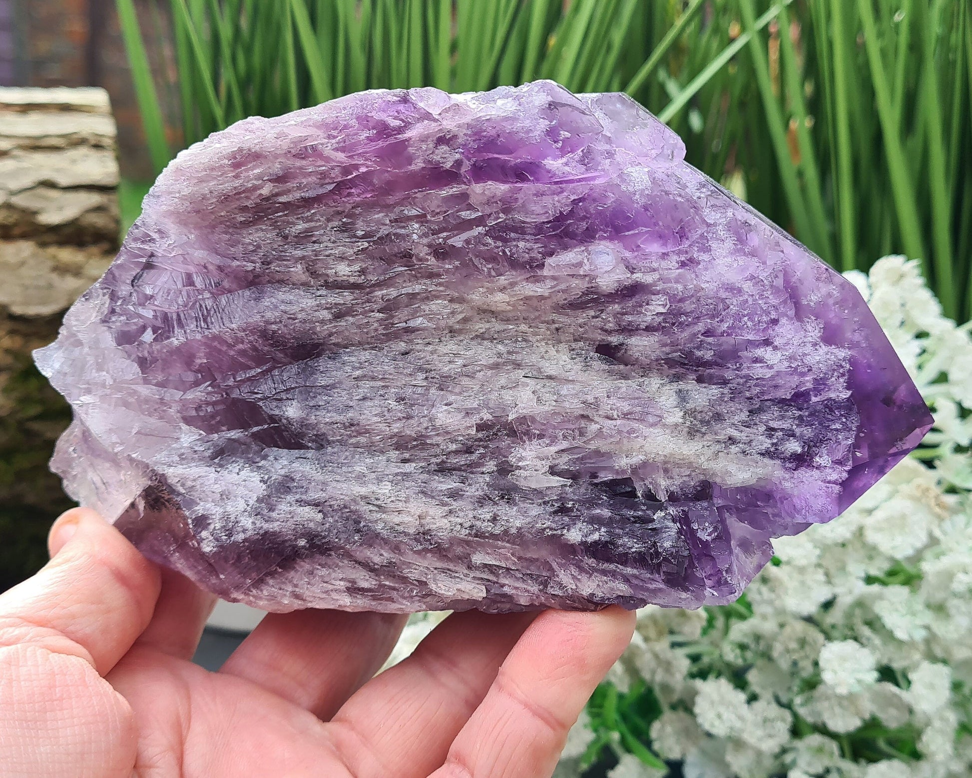 Elestial Amethyst from Brazil with layered formations and a natural point — deep spiritual insight, emotional healing, and peaceful energy.