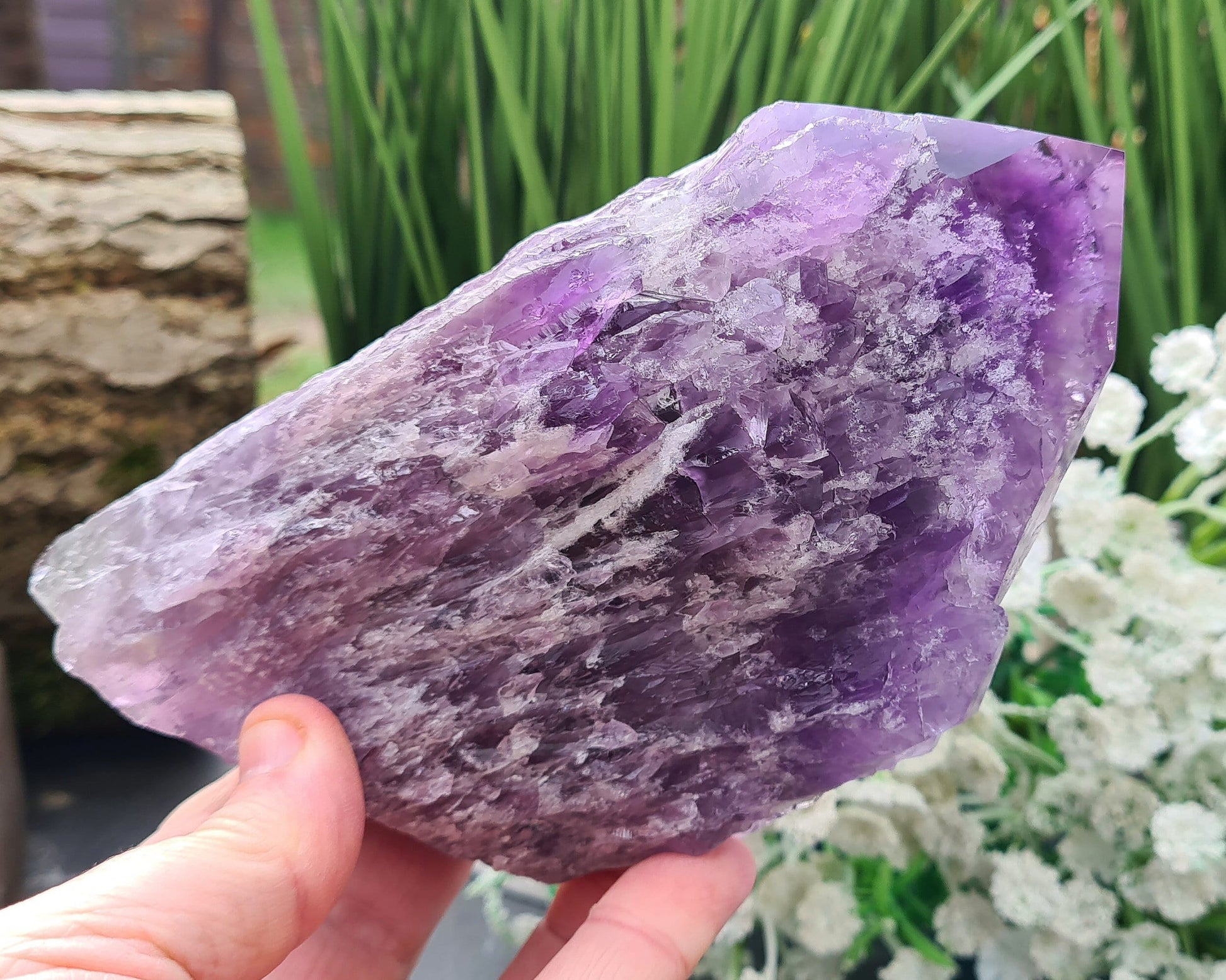Elestial Amethyst from Brazil with layered formations and a natural point — deep spiritual insight, emotional healing, and peaceful energy.