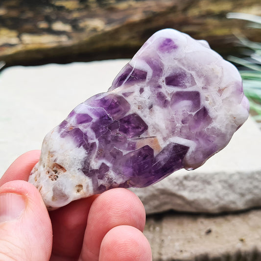 Chevron Amethyst, Polished both sides. Chevron Amethyst is naturally occurring Amethyst and White Quartz in a banded pattern. From Brazil. Can be used cleanse crystals of negative energy by placing it on top of this piece.