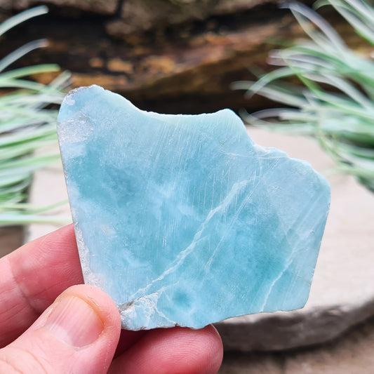 Larimar Crystal. The front and back of this piece is flat, not highly polished so keeps a natural look to it. From Dominican Republic. Also known as Dolphin Stone, Blue Pectolite.