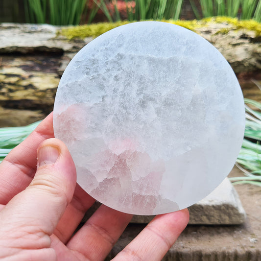 Selenite Cleansing and Charging Plate from Morocco. These circular cleansing and charging plates make sure your crystals are charged and energised for when you need them. 