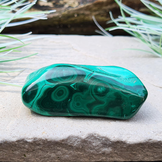 Malachite Crystal Freeform from the Congo. Polished Malachite which has wonderful green markings.
