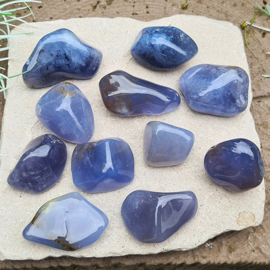 Blue Chalcedony crystal tumble stones from Namibia. Lovely deep blue/grey colour. XL size. Great to place on or around the body, place in your purse or have set as a piece of jewellery. Great quality.