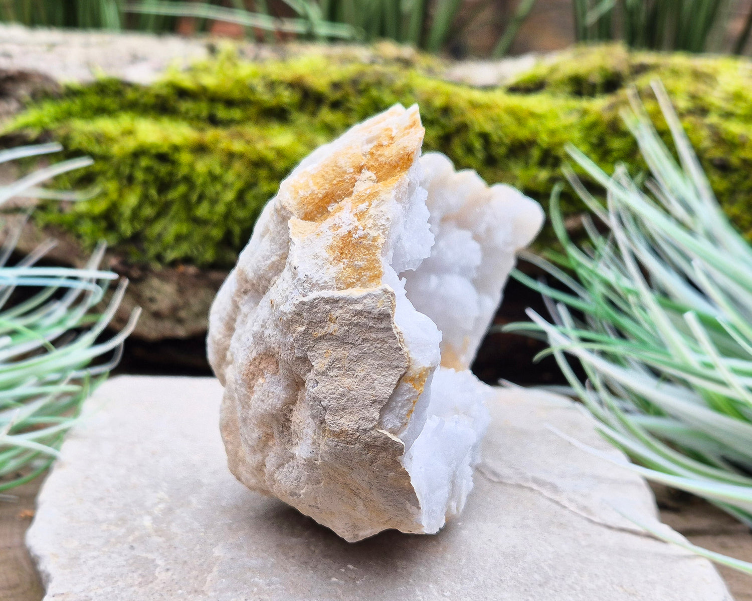 White Quartz Crystal Geode Half, from Morocco. Lovely sparkling white quartz crystal formations. It can sit on an even surface by itself.