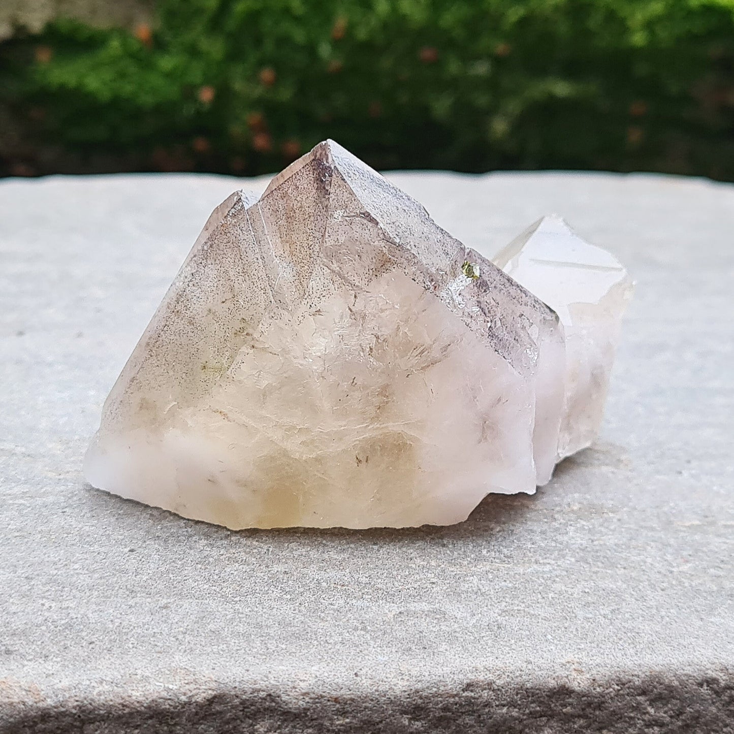 Amethyst and Citrine with Hematite inclusions, natural point, from the Sichuan Province, China. Base is cut flat so it will sit on an even surface.