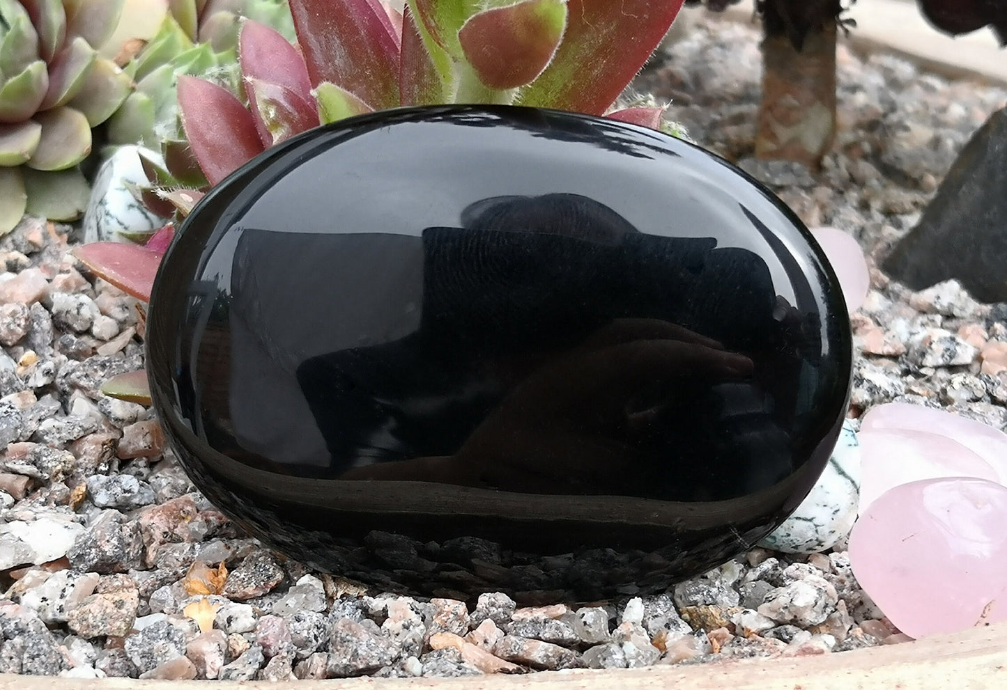 Black Obsidian Crystal Palm Stone. Lovely shiny polish.