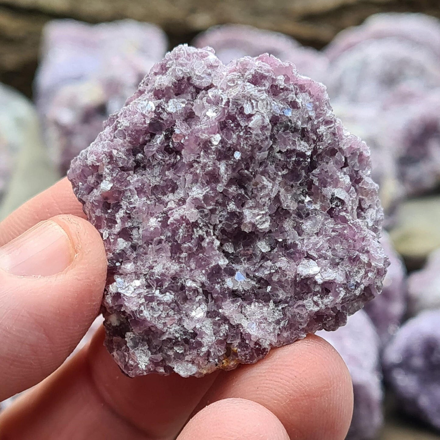 Natural raw Lepidolite crystals rom Brazil. Calm and uplift spirits, dispel negativity. Aid depression, addiction, and decision-making. Seek your independence.