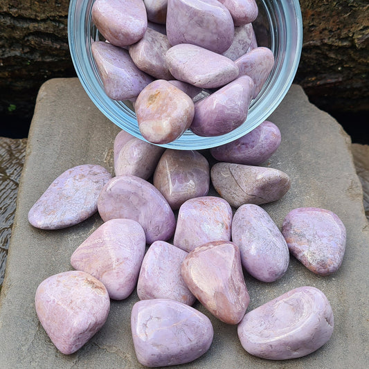 Purple Jade Tumble Stone. Often referred to as Lavender Jade. it is primarily composed of two minerals: nephrite and jadeite.