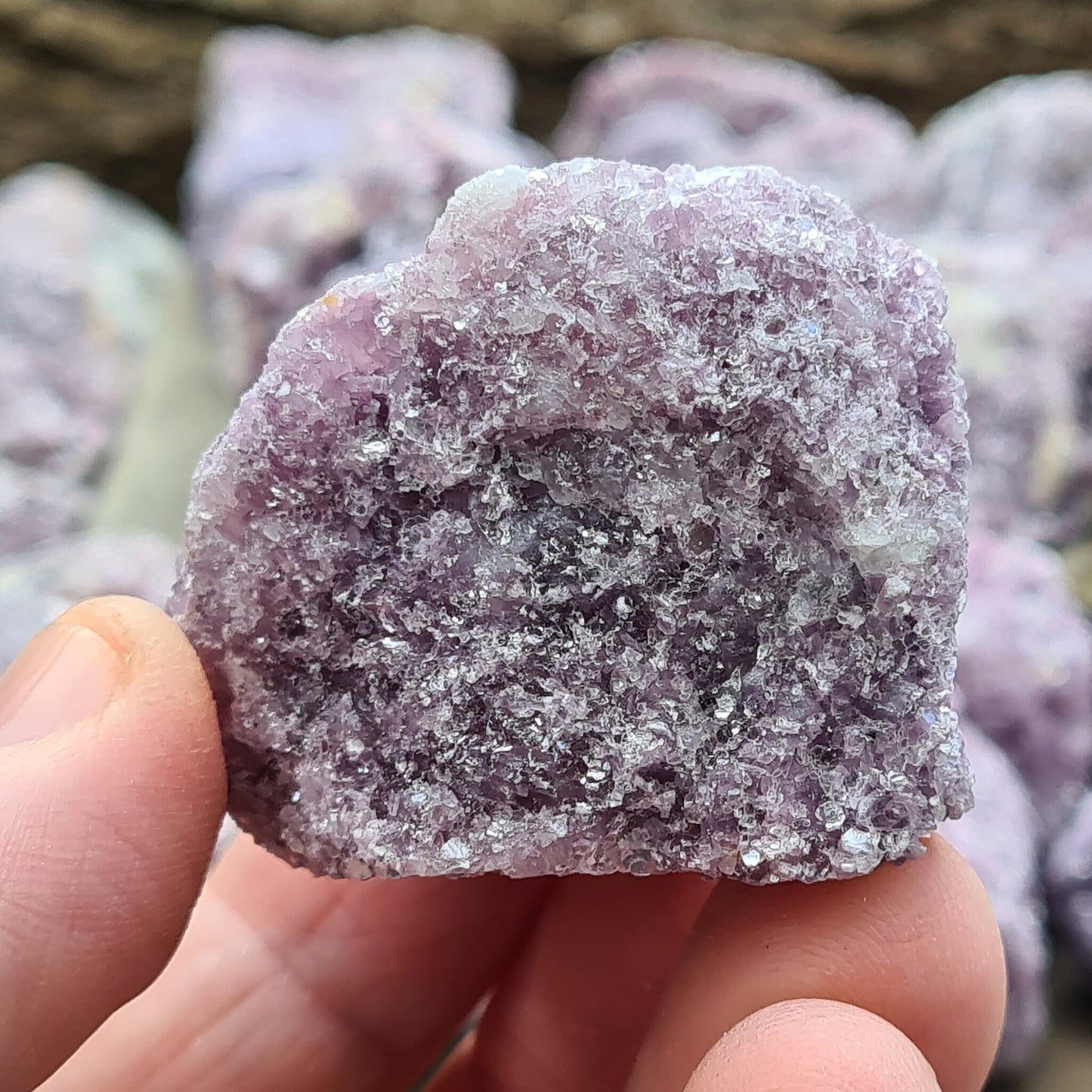 Natural raw Lepidolite crystals rom Brazil. Calm and uplift spirits, dispel negativity. Aid depression, addiction, and decision-making. Seek your independence.