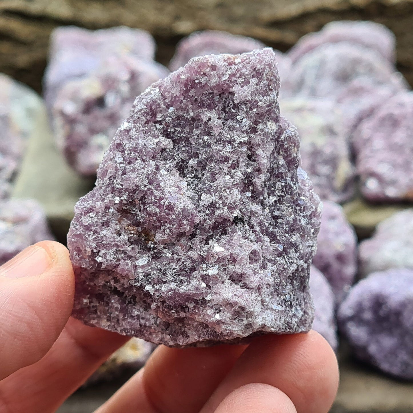 Natural raw Lepidolite crystals rom Brazil. Calm and uplift spirits, dispel negativity. Aid depression, addiction, and decision-making. Seek your independence.