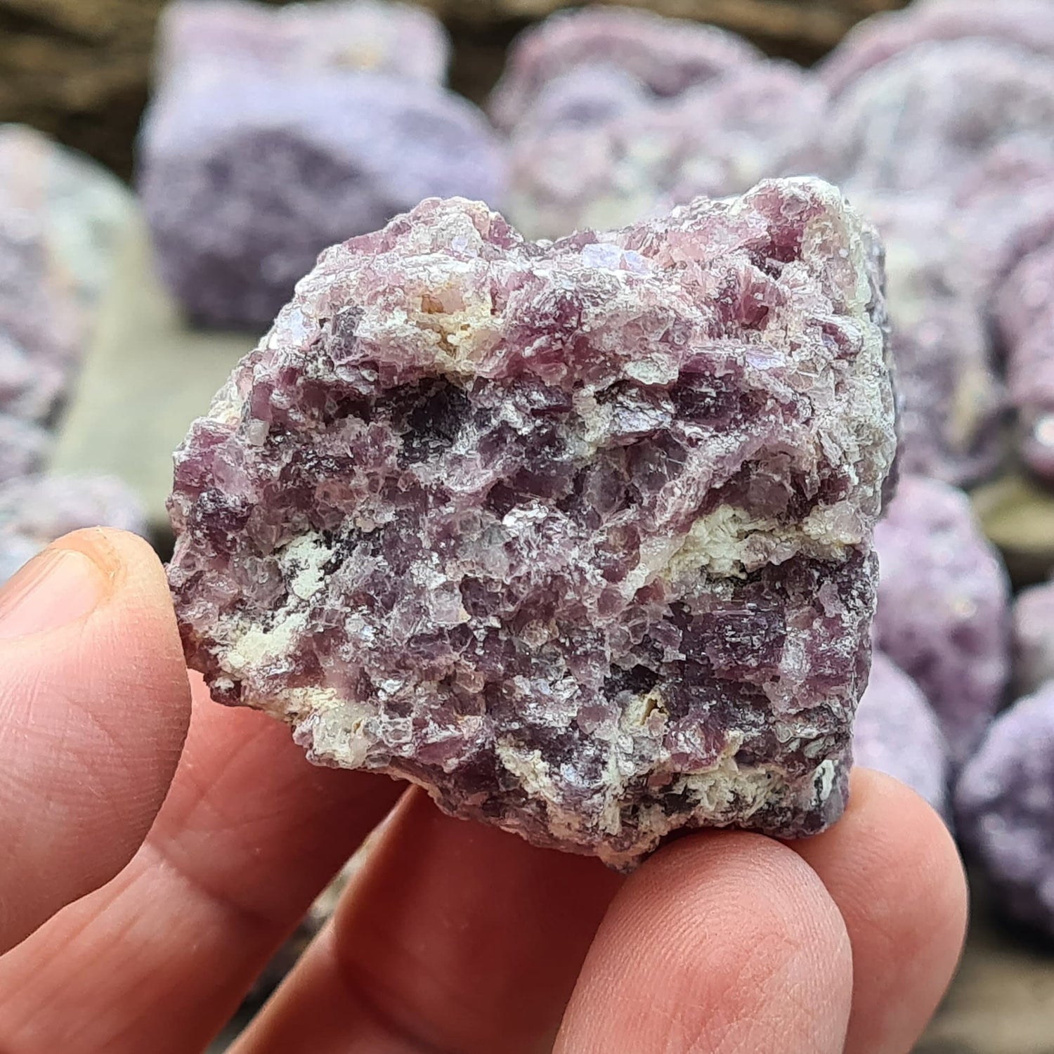 Natural raw Lepidolite crystals rom Brazil. Calm and uplift spirits, dispel negativity. Aid depression, addiction, and decision-making. Seek your independence.