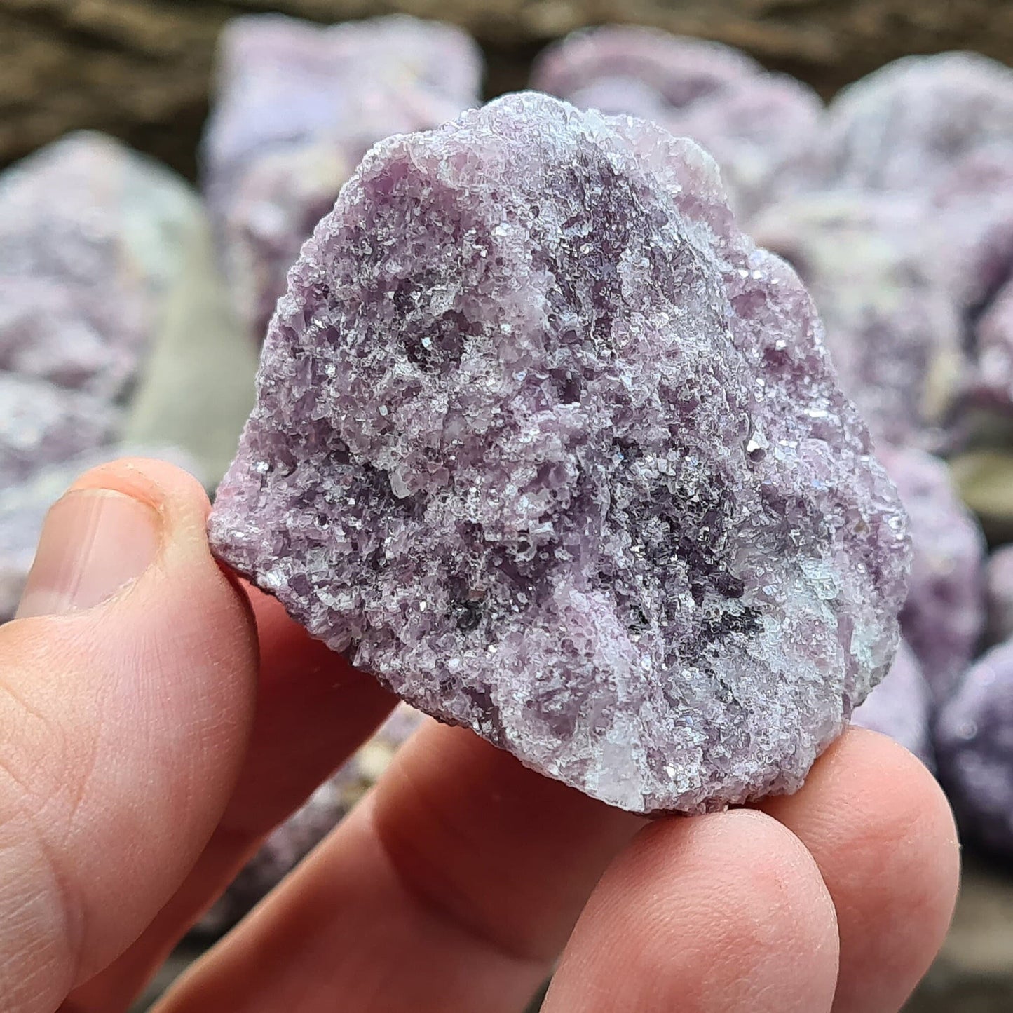 Natural raw Lepidolite crystals rom Brazil. Calm and uplift spirits, dispel negativity. Aid depression, addiction, and decision-making. Seek your independence.