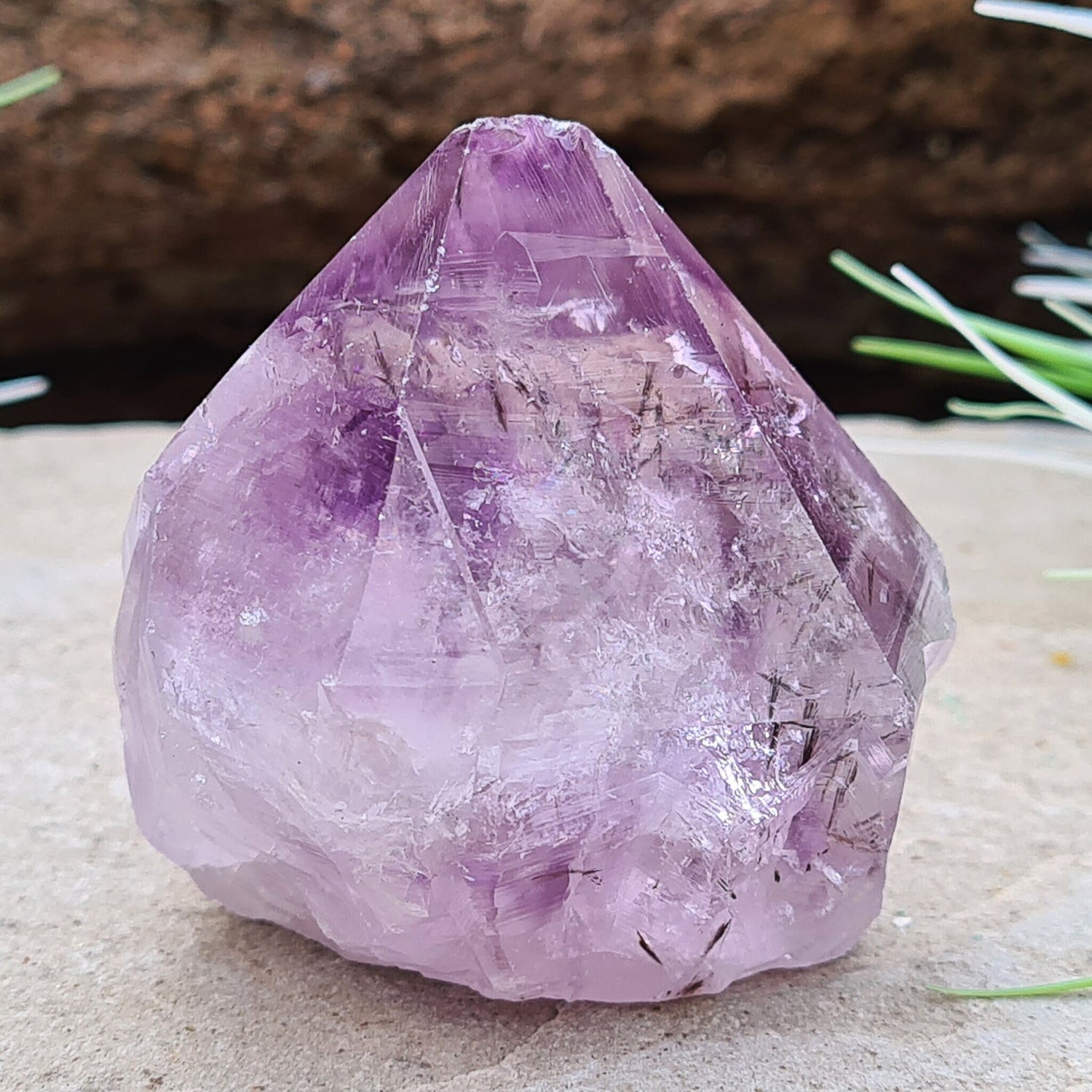 Amethyst Crystal Point with Goethite Inclusions. 