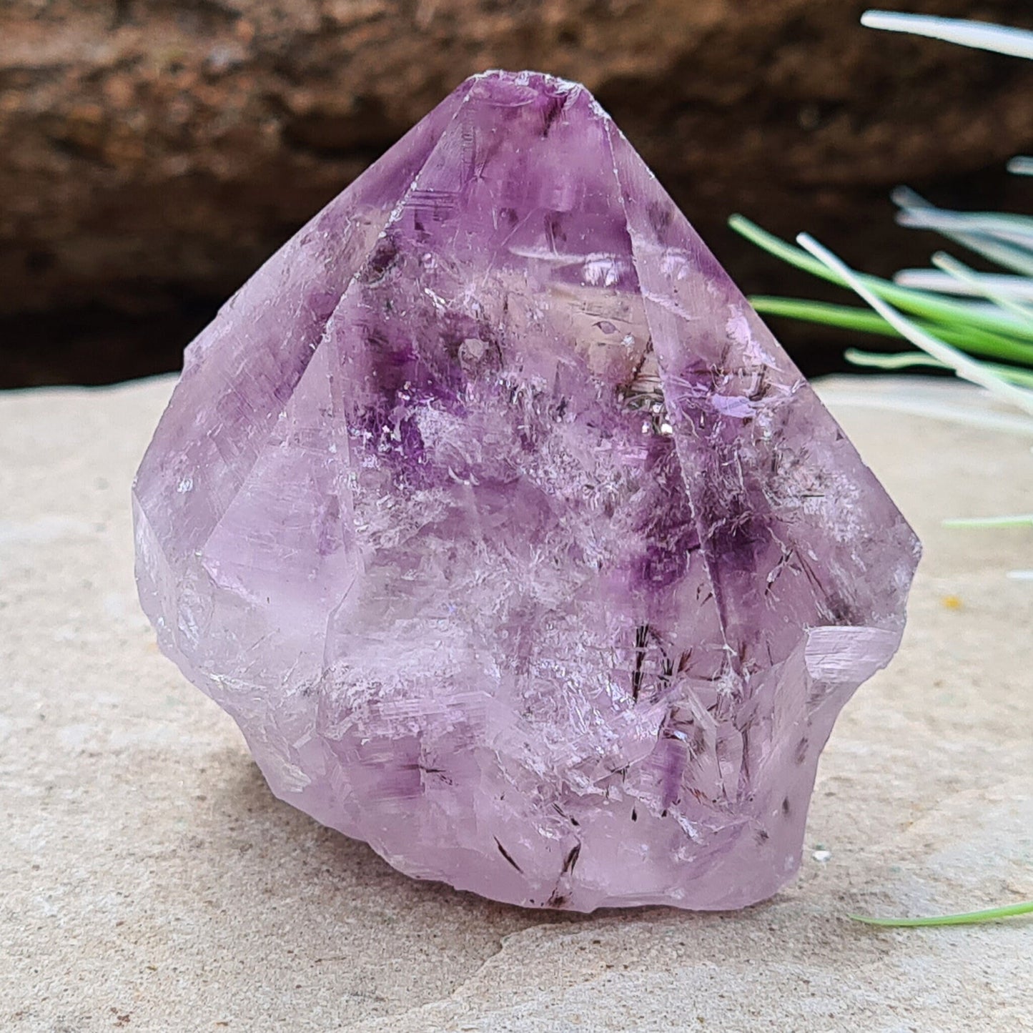 Amethyst Crystal Point with Goethite Inclusions. 