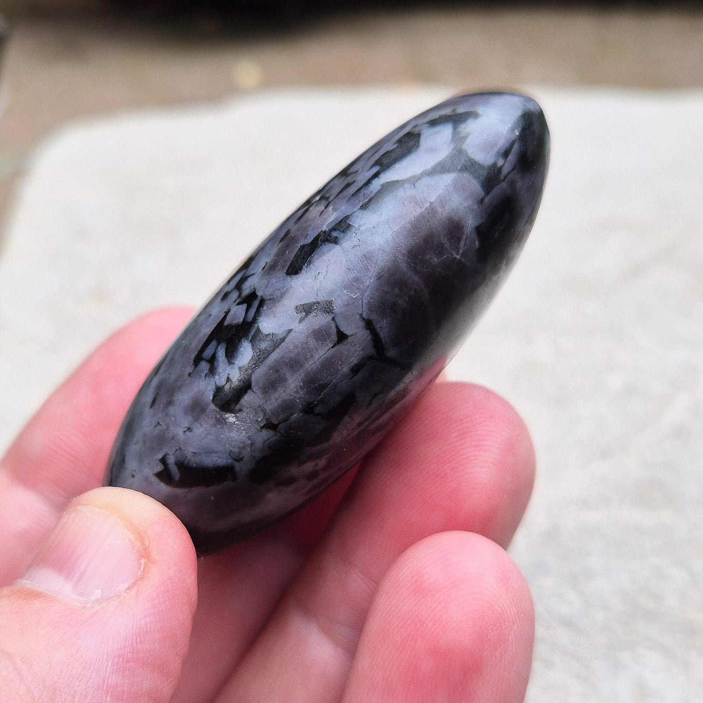 Indigo Gabbro Crystals, also known as Mystic Merlinite, originates from Madagascar. This a stunning stone formed deep within the Earth when molten magma cools slowly. 