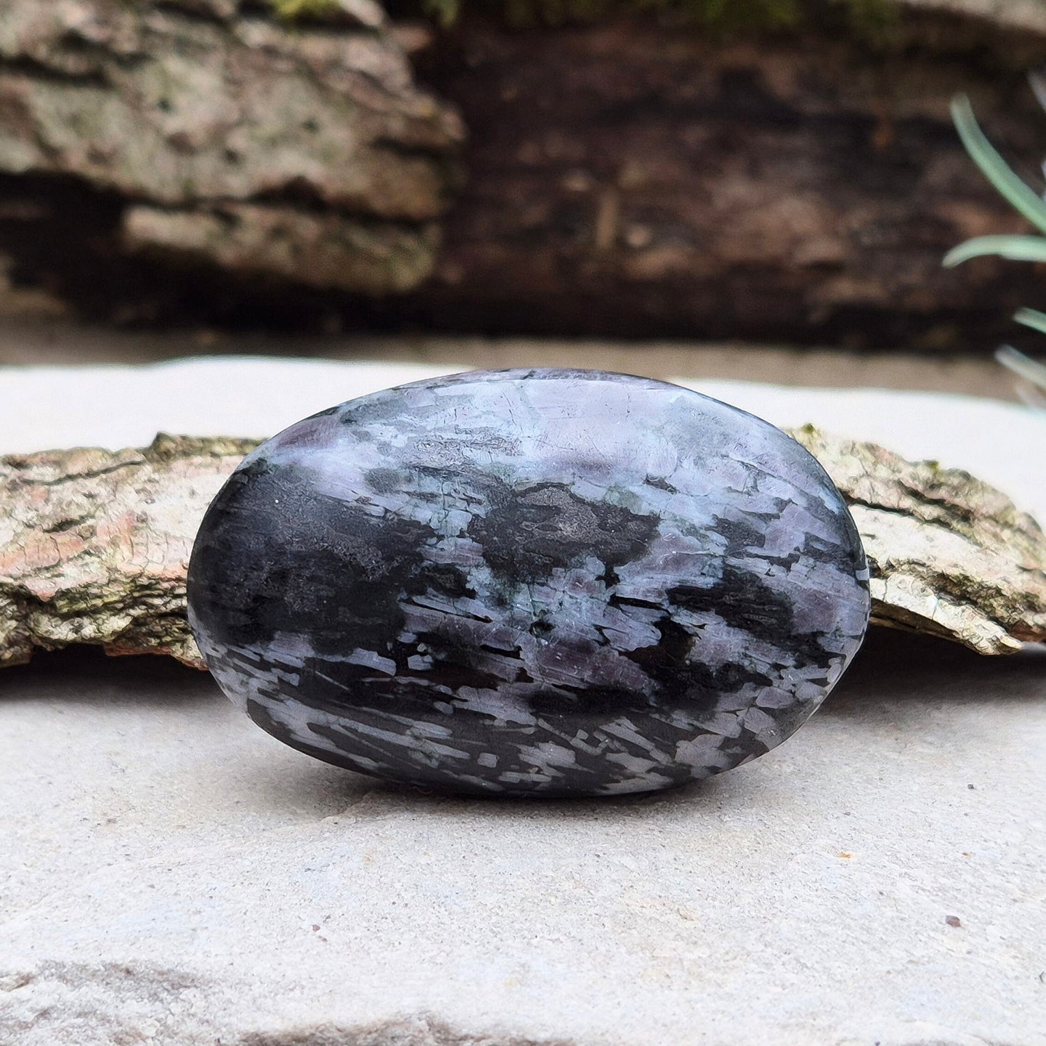 Indigo Gabbro Crystals, also known as Mystic Merlinite, originates from Madagascar. This a stunning stone formed deep within the Earth when molten magma cools slowly. 