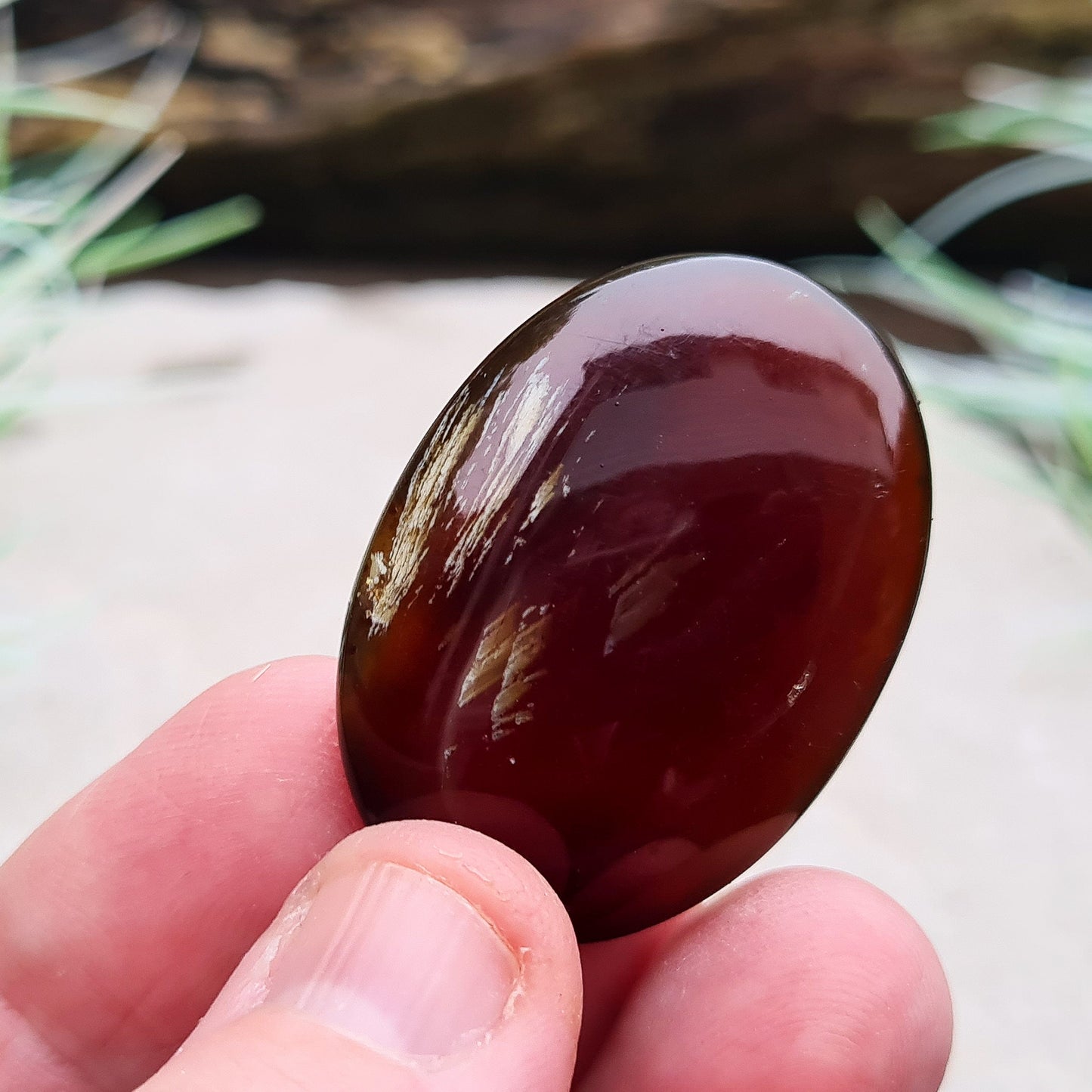 Blue Amber Palm Stone from Sulawesi, Indonesia. Blue Amber is a rare type of amber that glows blue under UV light 