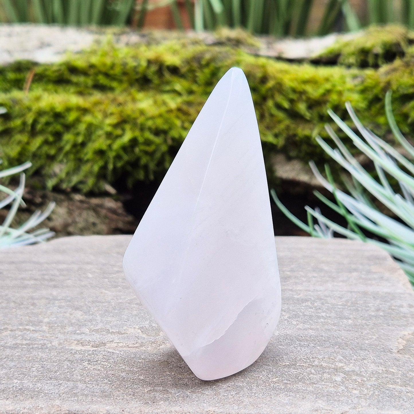 Mangano Calcite Crystal Free Form, Polished, does have the visible stripy banding which does not always show up in the photos of videos. Also known as Pink Calcite.