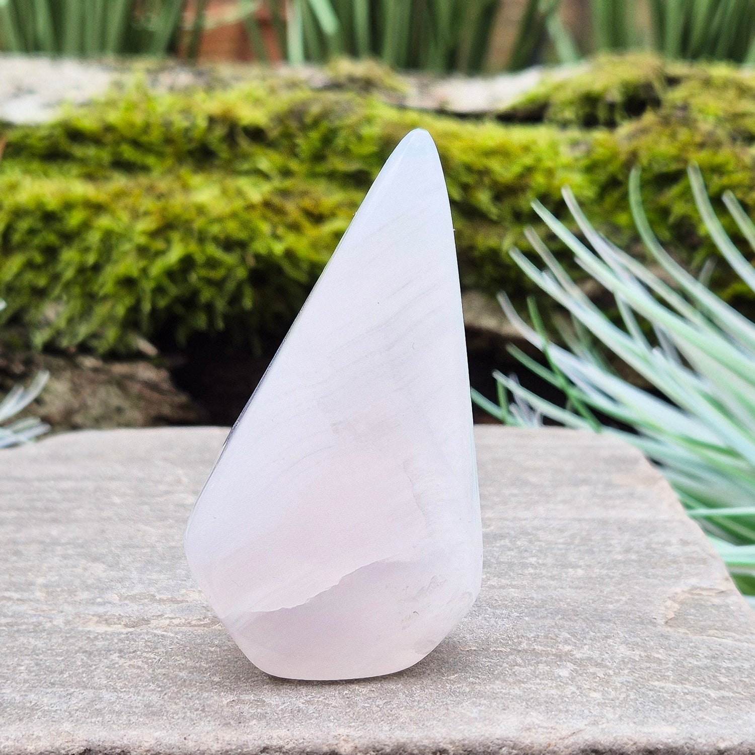 Mangano Calcite Crystal Free Form, Polished, does have the visible stripy banding which does not always show up in the photos of videos. Also known as Pink Calcite.