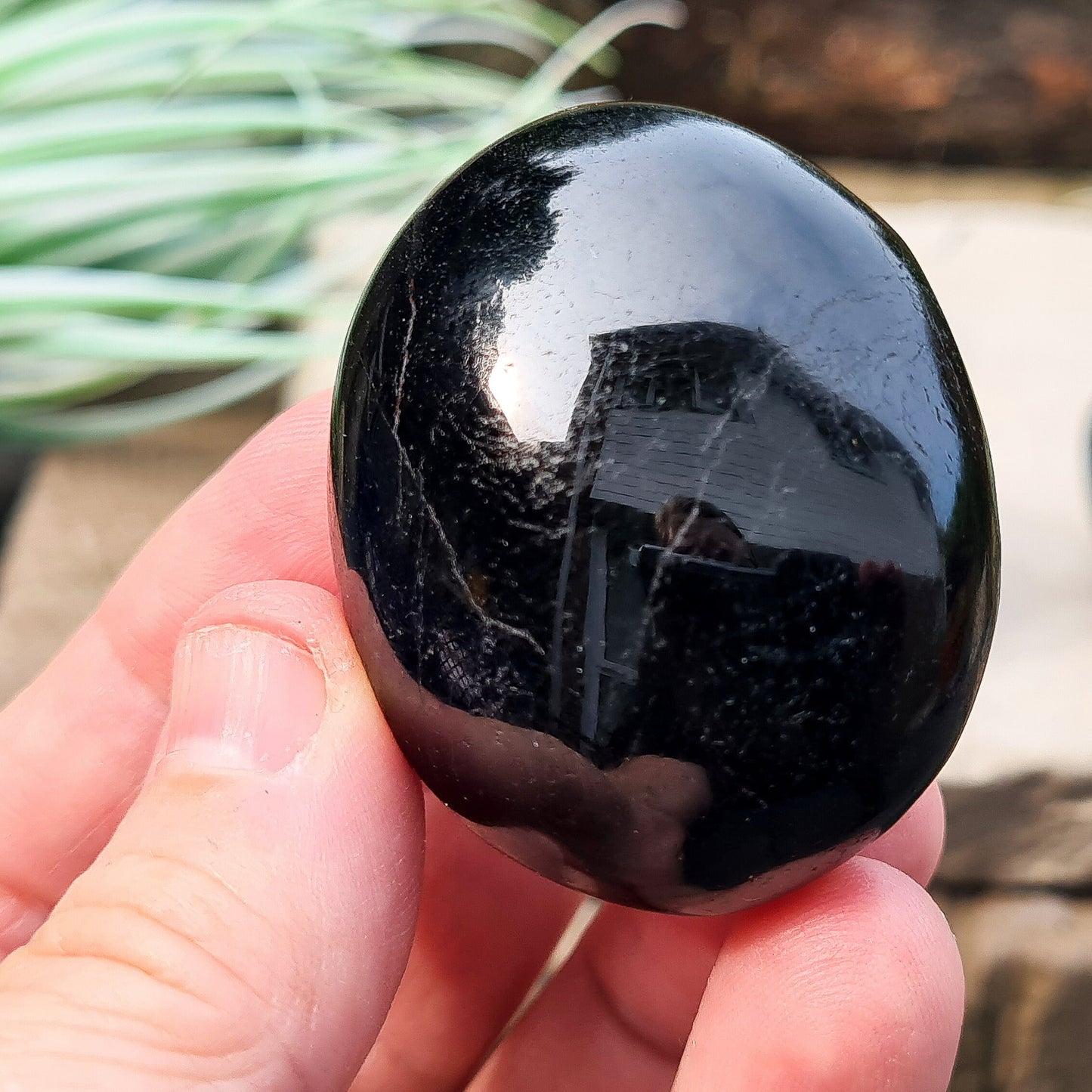 Polished Black Tourmaline crystal from Brazil. Really lovely polished pieces of Black Tourmaline with a shiny lustre. Black Tourmaline is also known as Schorl. Oval shaped.