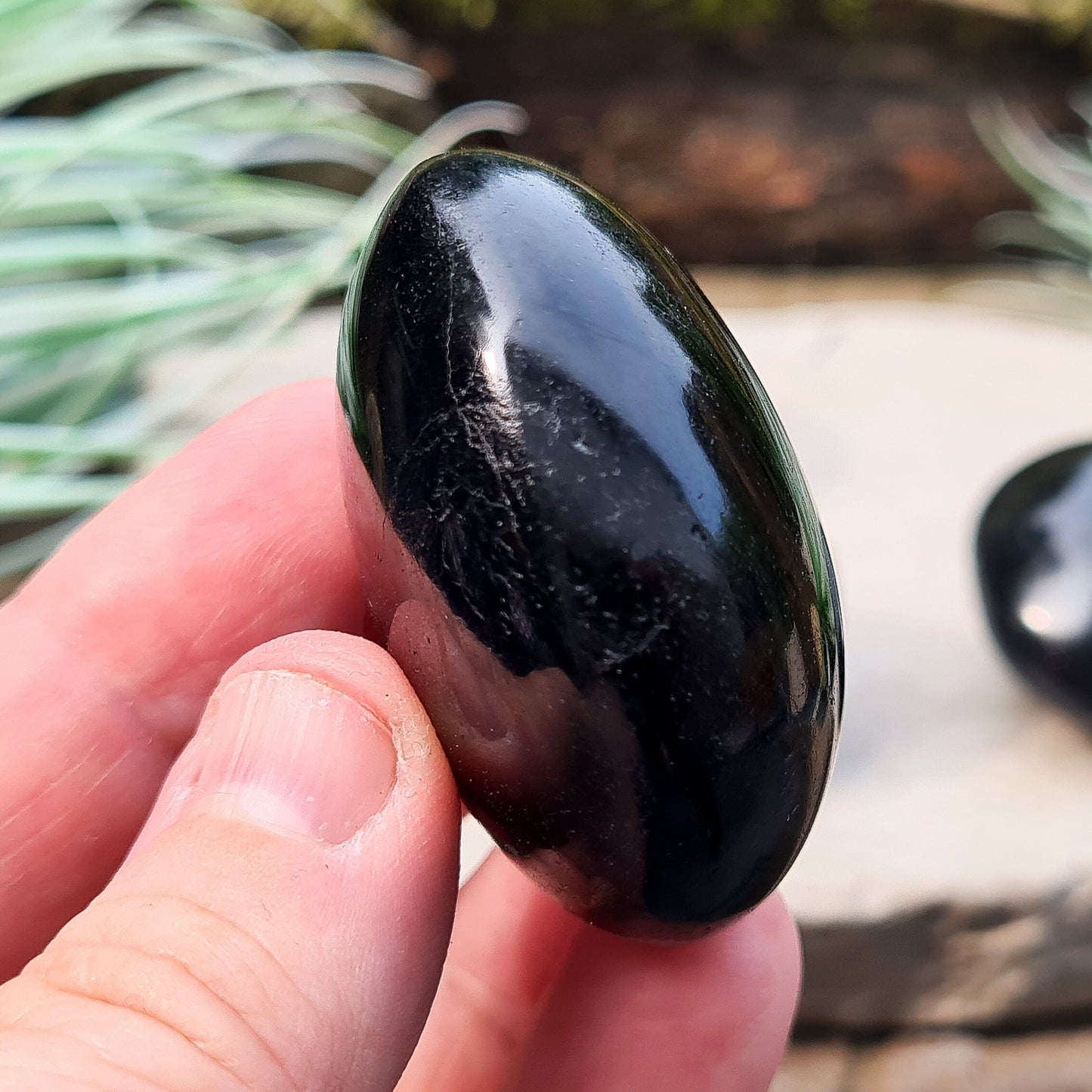 Polished Black Tourmaline crystal from Brazil. Really lovely polished pieces of Black Tourmaline with a shiny lustre. Black Tourmaline is also known as Schorl. Oval shaped.