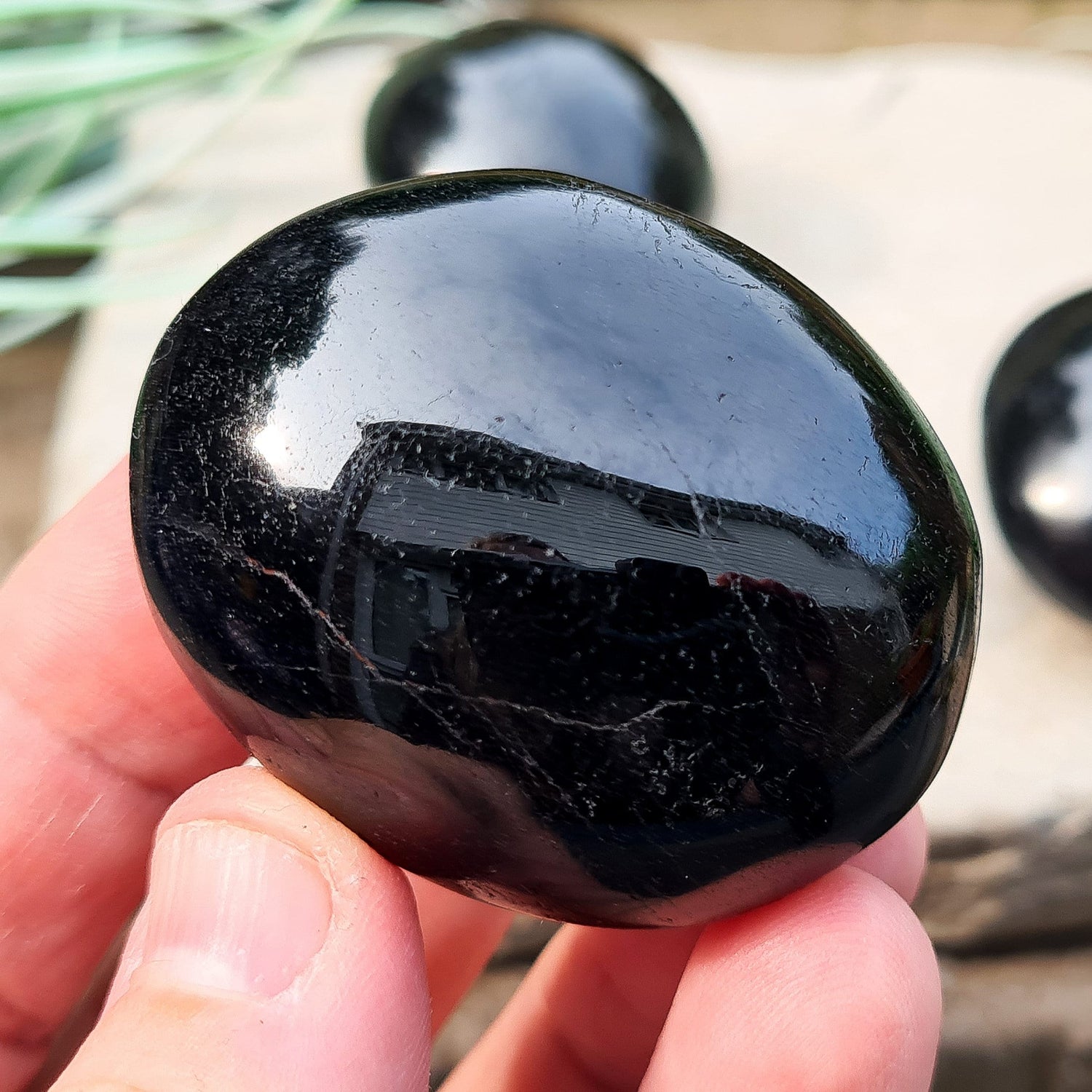 Polished Black Tourmaline crystal from Brazil. Really lovely polished pieces of Black Tourmaline with a shiny lustre. Black Tourmaline is also known as Schorl. Oval shaped.