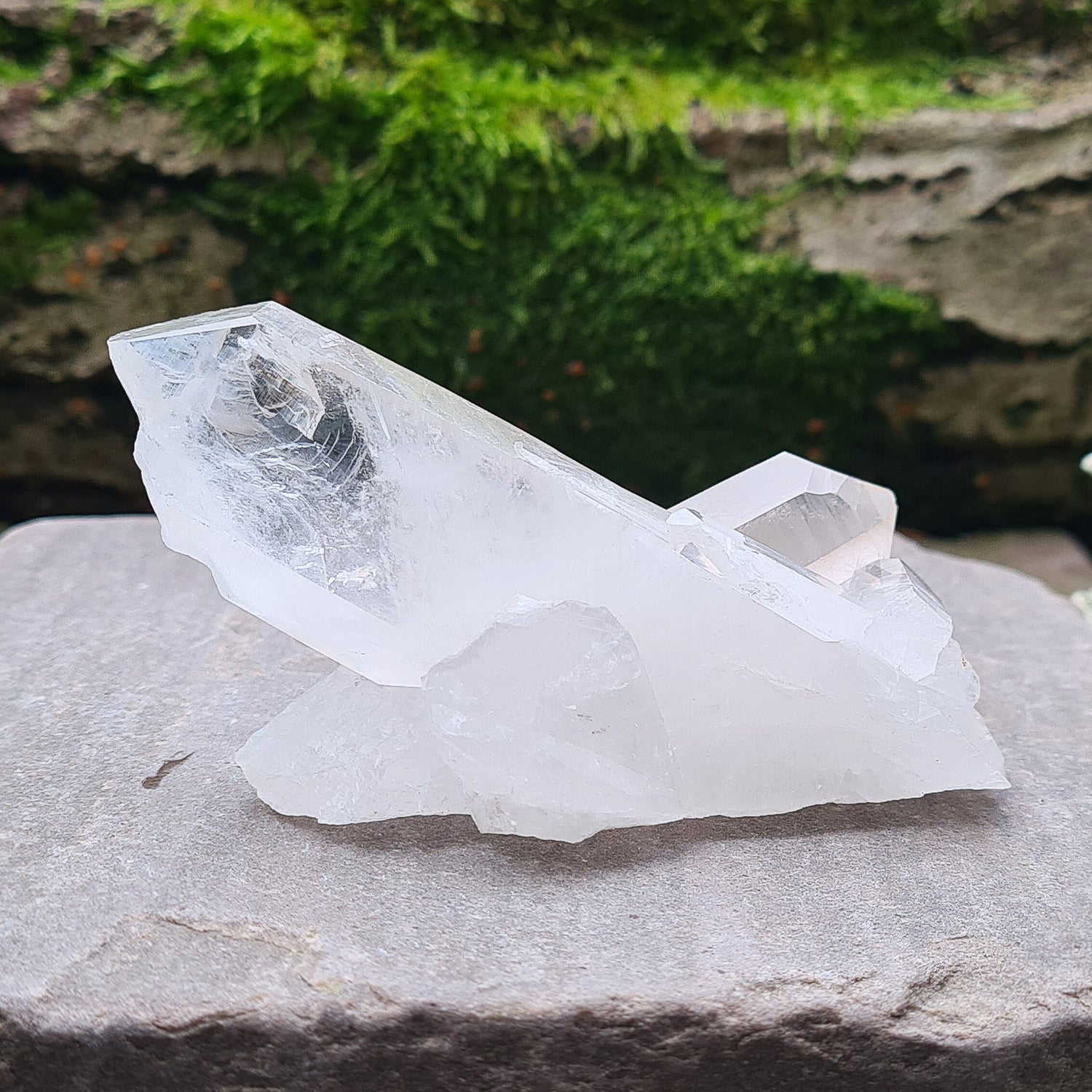 Madagascan Quartz Crystal Cluster with 2 points growing in a cross like formation and a smaller point. This crystal will self stand.